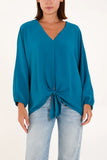 As Seen in Unique’s Video: V Neck Front Tie Blouse in Teal